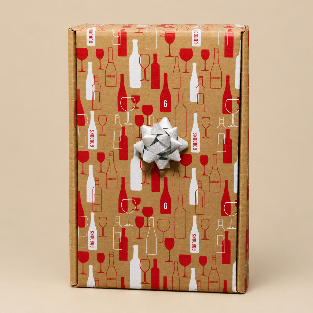 Gordon's kraft wine gift box with silver bow, isolated on a neutral background